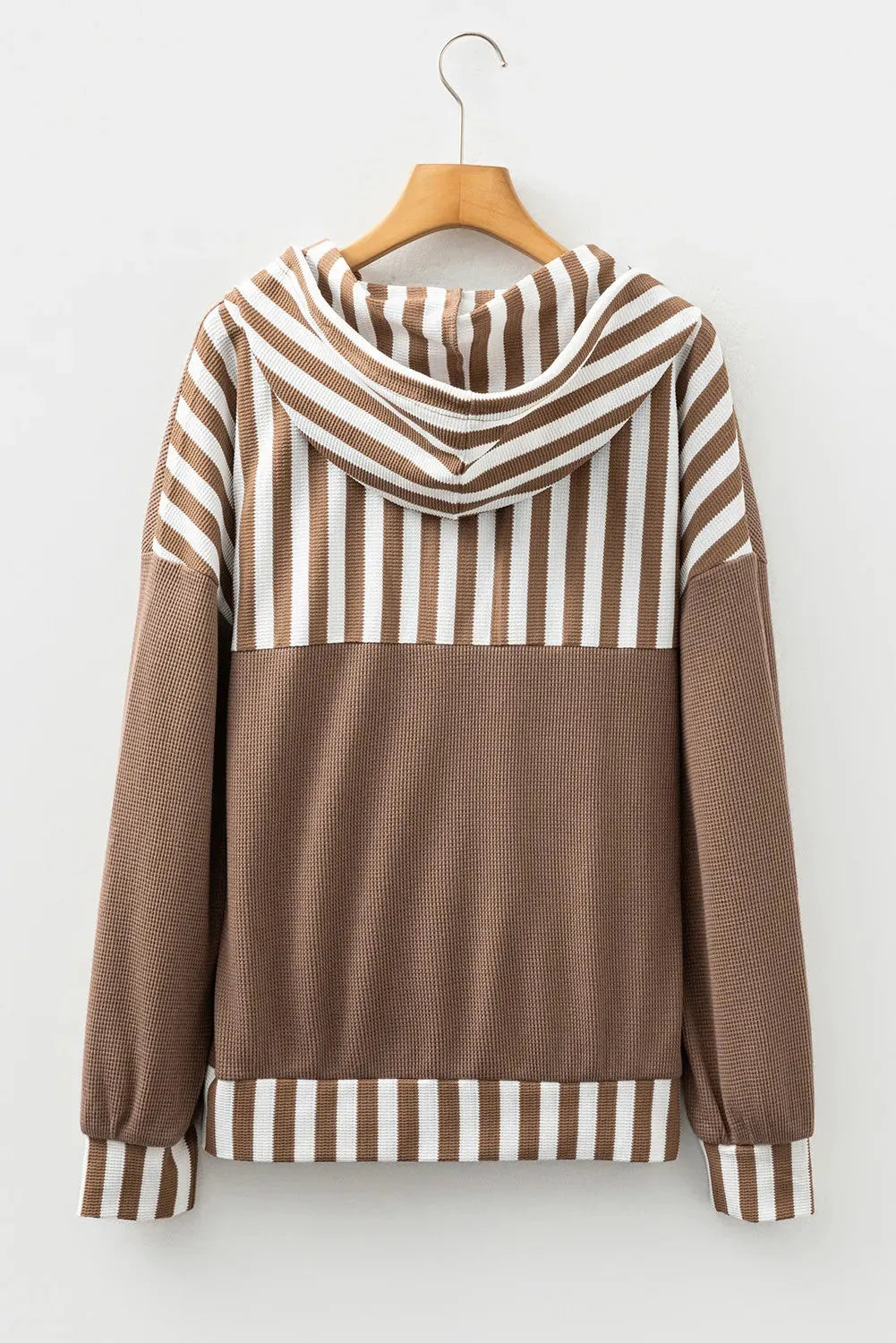 Straw yellow women's hoodie with waffle texture, patchwork stripes, a drawstring hood, and button neck.