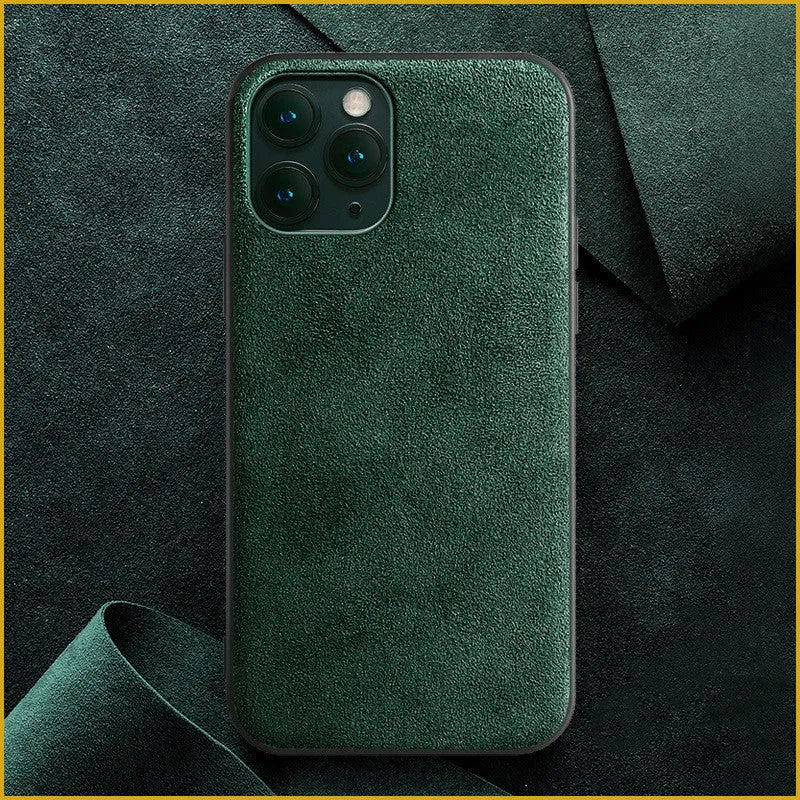 Suede full-cover phone case for iPhone on a dark background, shown in elegant black, dark night green, and dark blue colours.