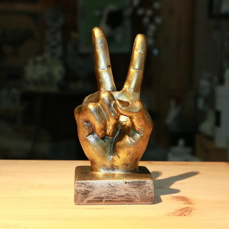 Resin gesture ornament in silver OK hand sign on desktop, blessing home decoration