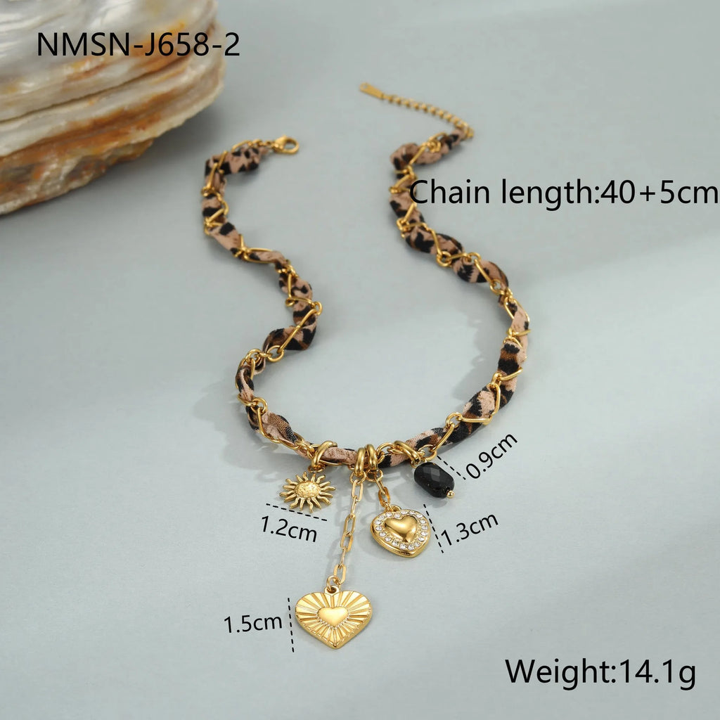 Stainless steel women's necklace with 18K gold electroplating showing geometric pendant design
