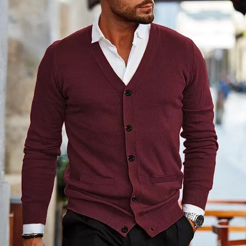 Men's slim fit acrylic cardigan in a dark grey colour, showing long sleeves and button front.