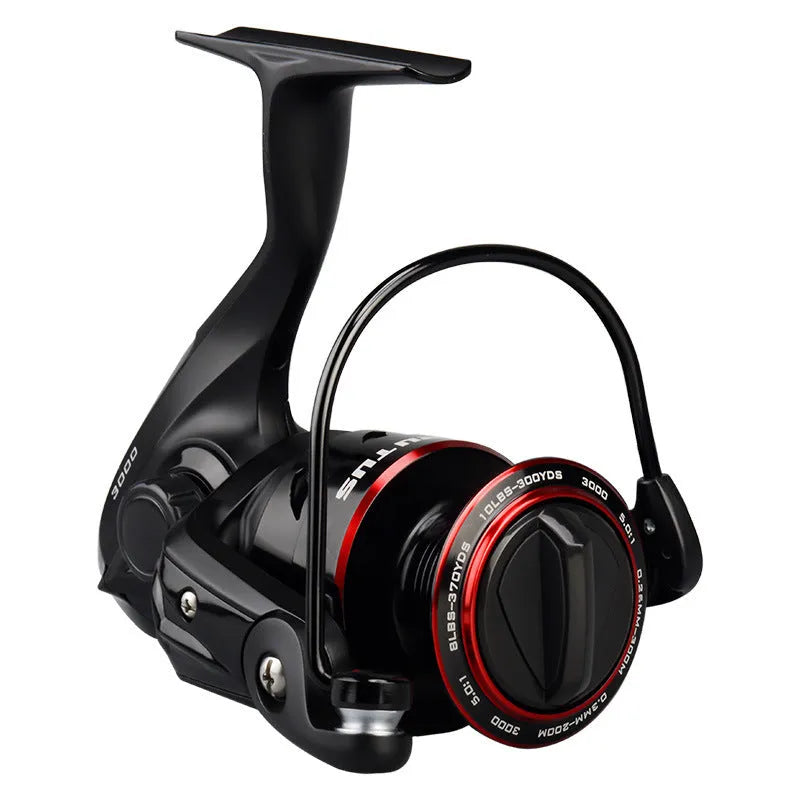 All metal spinning fishing reel in 2000 series on white background