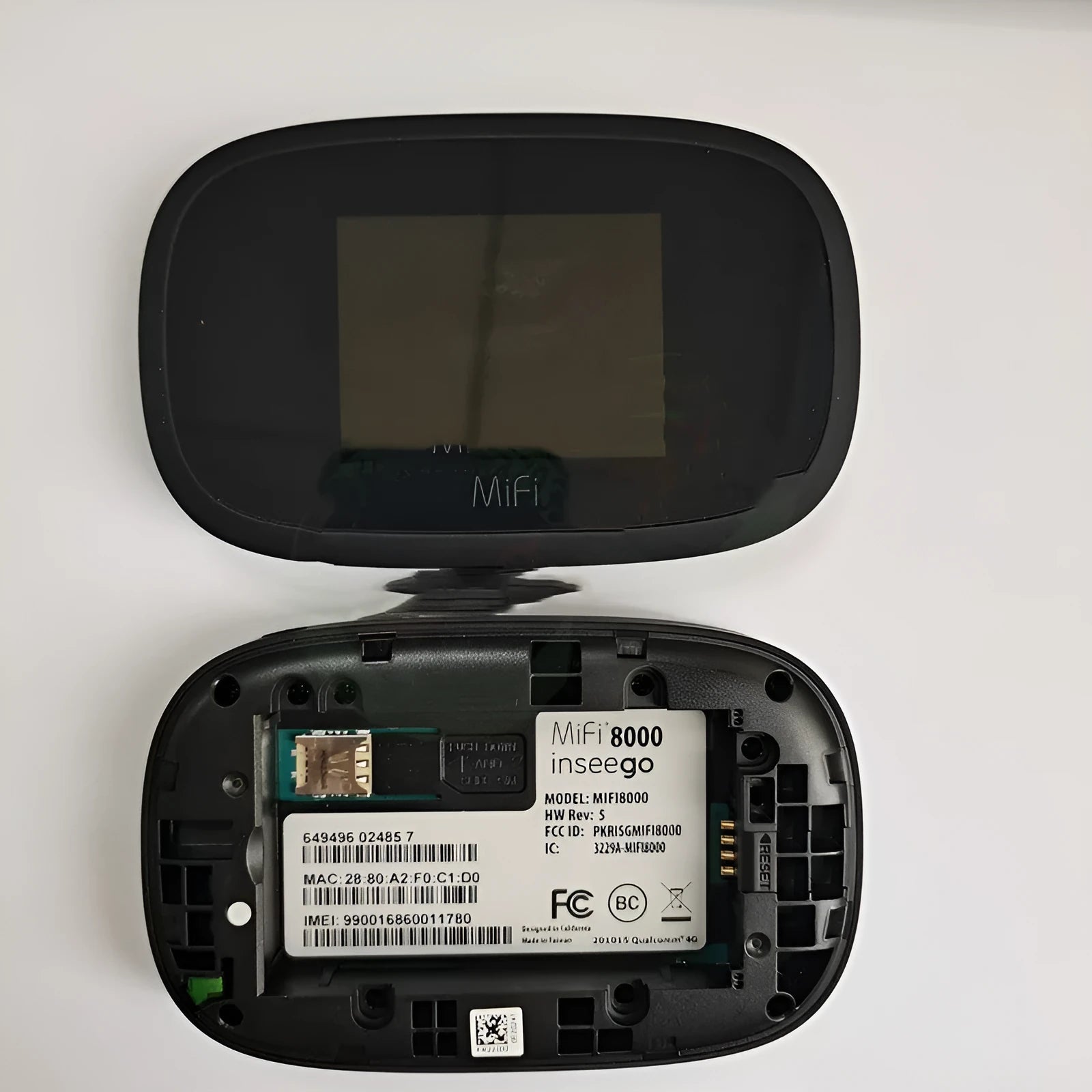 Black portable 4G wireless router with compact dimensions for mobile internet access