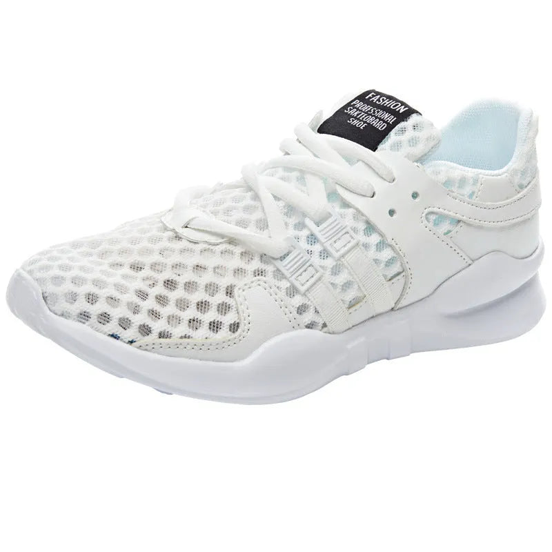 Low-top mesh sneaker with hollow breathable design and round toe in black and white colour options