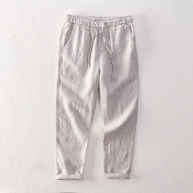 Linen breathable straight trousers for men in khaki colour, mid-waist cut on white background