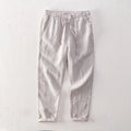 Linen breathable straight trousers for men in khaki colour, mid-waist cut on white background
