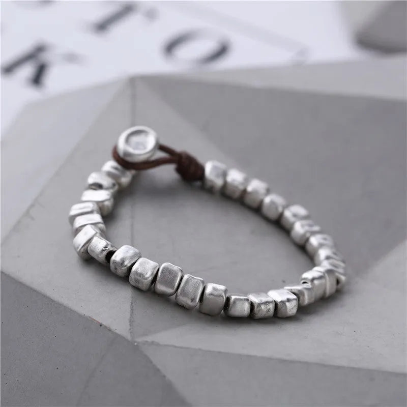 Women's handmade irregular silver square bracelet with wooden charm on elastic band