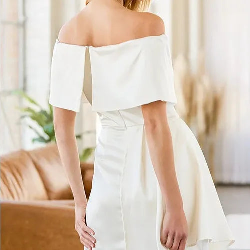 Women's strapless off-shoulder dress with high waist and lace-up detail on a patchwork midi skirt.