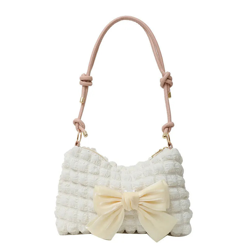 Women's canvas one-shoulder handbag in horizontal square shape with single strap and mobile phone compartment