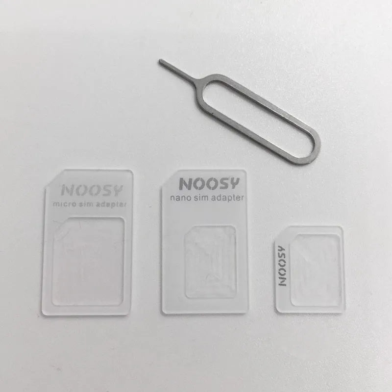 SIM Restore four-in-one adapter set with three SIM cards and metal picking pin in black and white