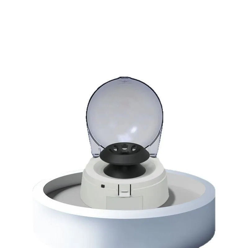 Small white mini laboratory benchtop centrifuge with closed lid, compact design