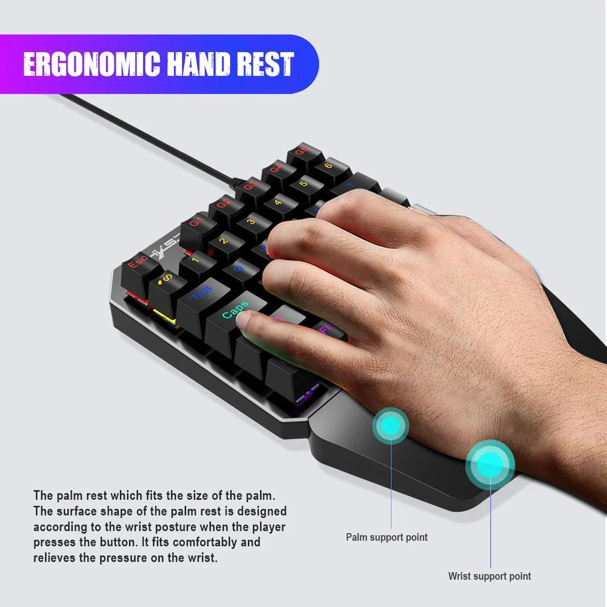 Mini one-handed mechanical gaming keyboard with 35 keys, seven-color backlight, and hand rest on desk