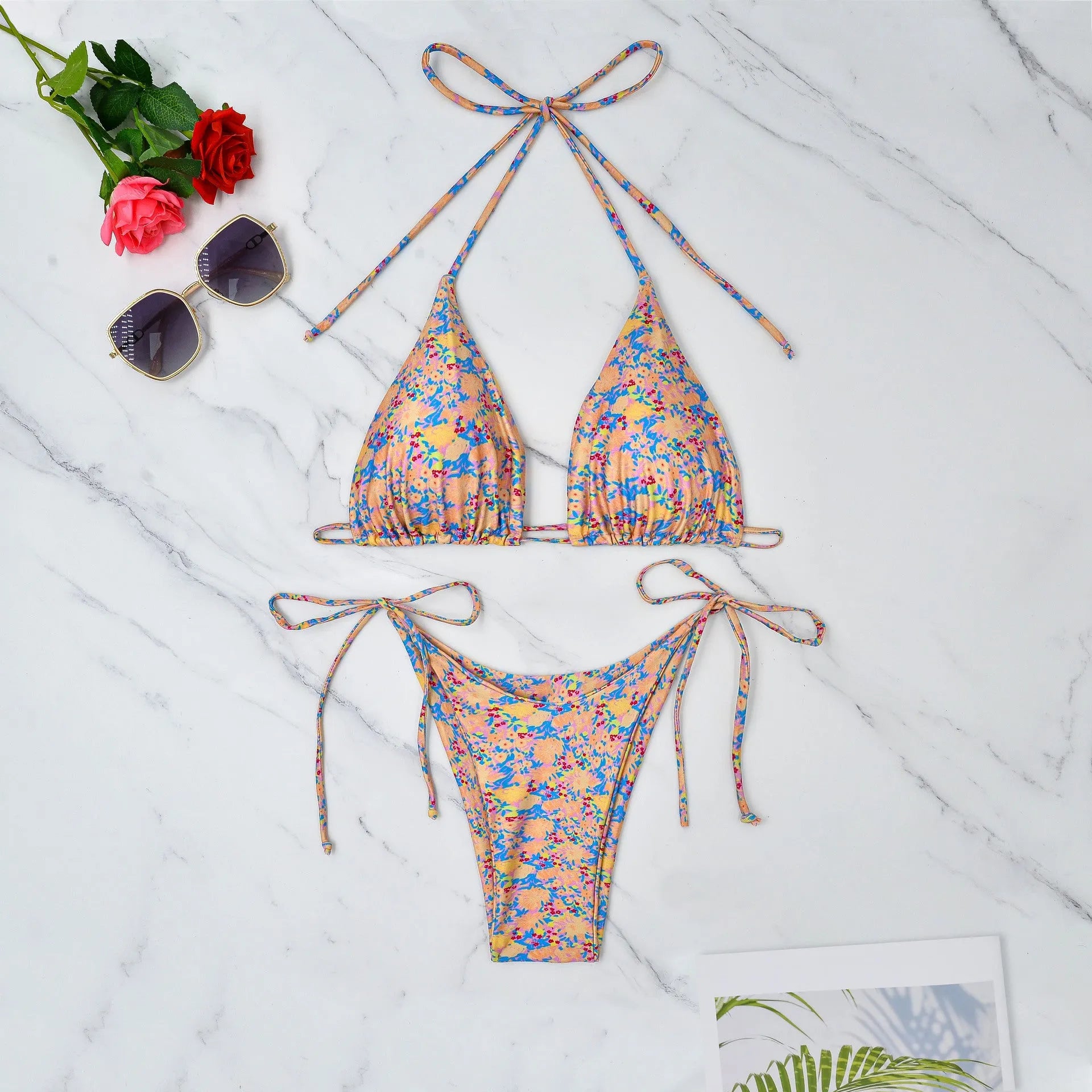 Women's lace-up front triangle bikini top and split high-cut briefs swimsuit set