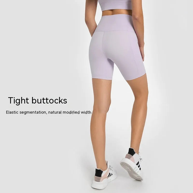Women's mid-length sports shorts in black, super stretch fabric for running and gym