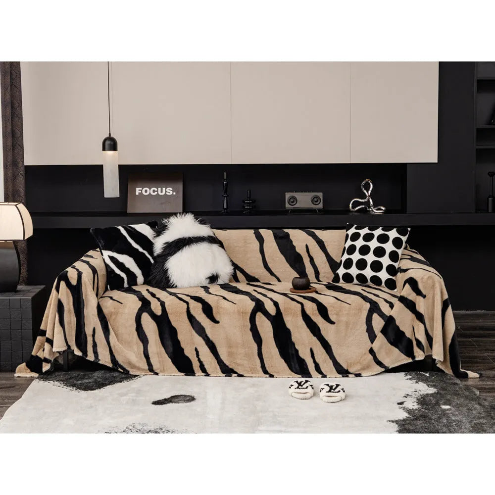 Zebra pattern flannel sofa cover in light luxury style draped over a sofa