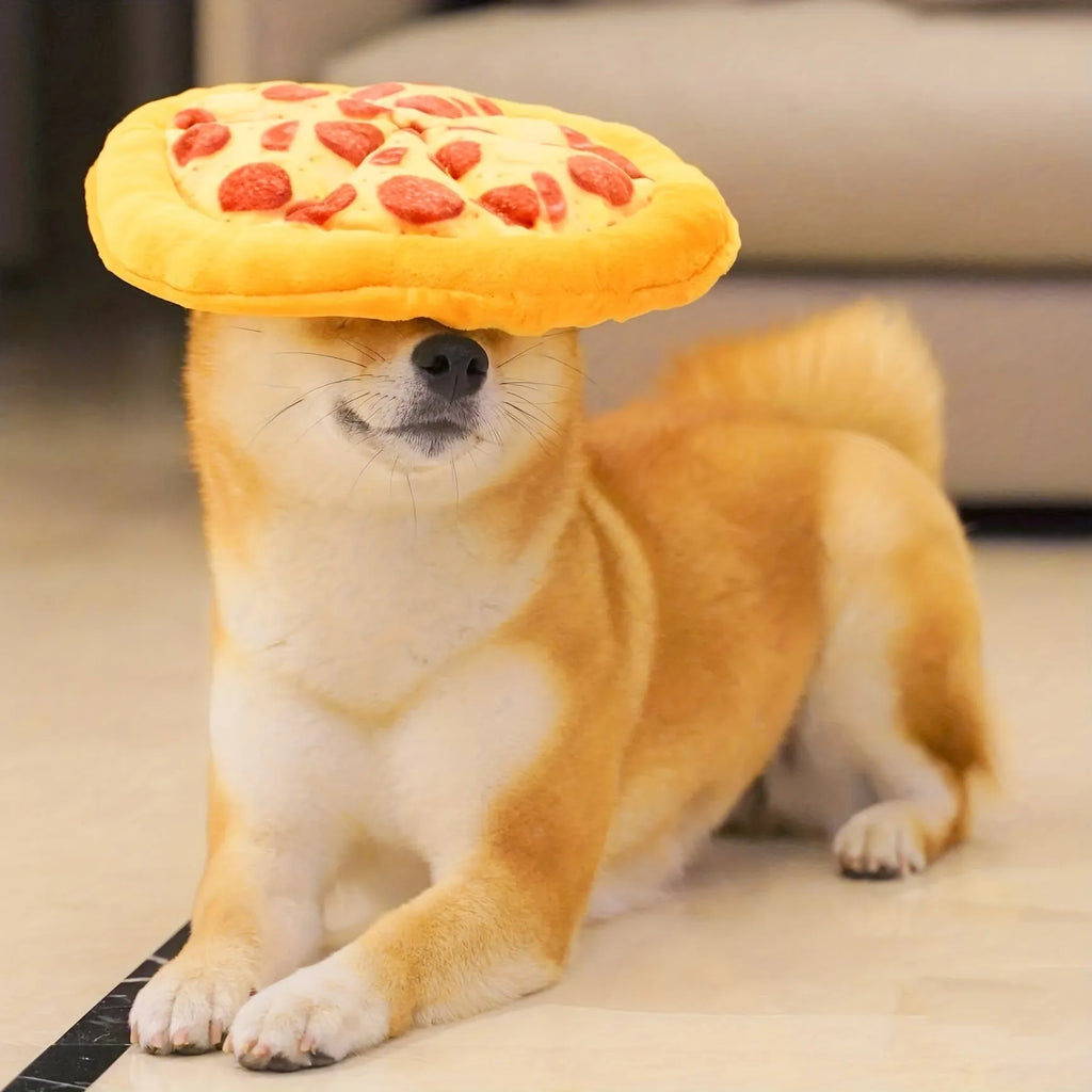Yellow plush pizza-shaped dog toy with a squeaker inside for chewing and interactive play.