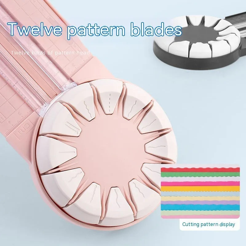 Pink and black 12-in-1 dotted plastic paper cutting machine on a white background.