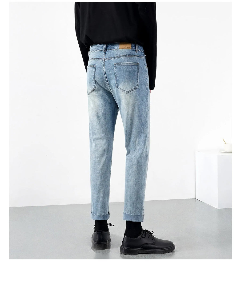 Men's light summer ripped jeans in blue with microelastic stretch denim, front view