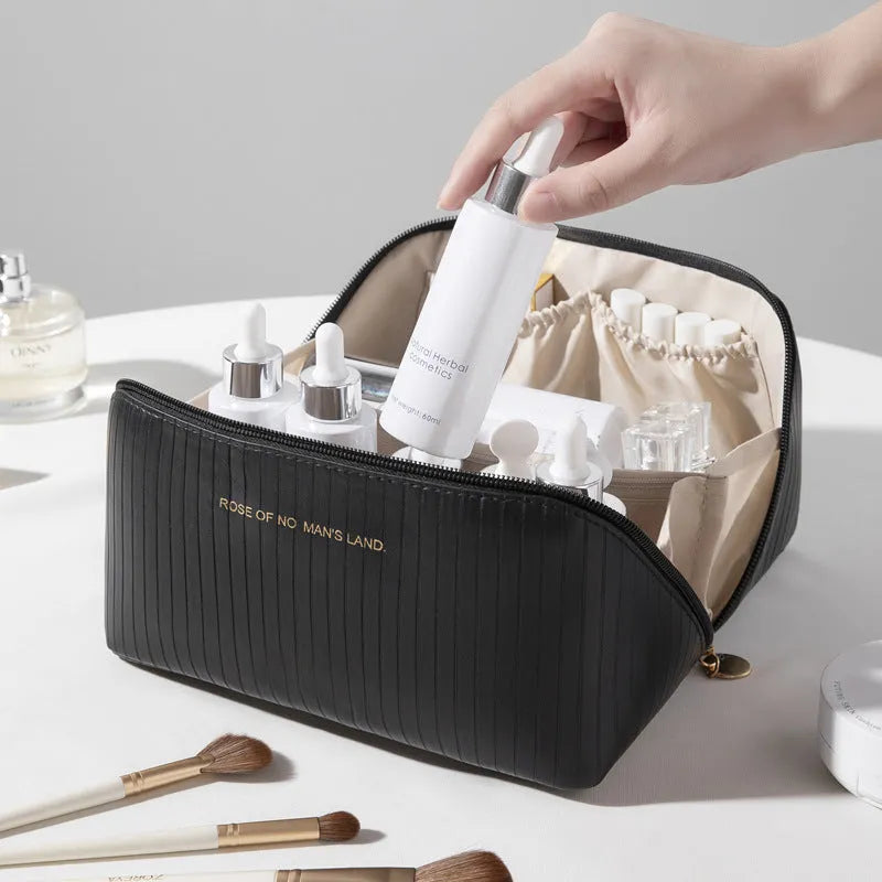 Vertical pattern makeup bag with cubic 22.5cm dimensions in beige, black, brown, grey, and pink colour options