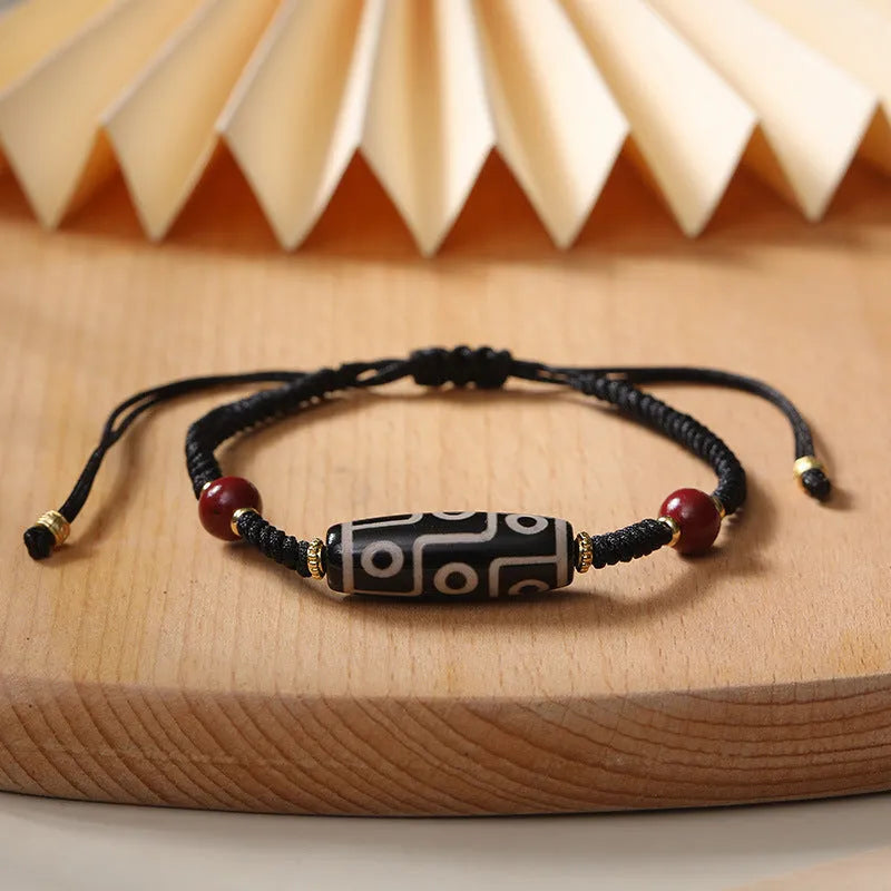 Tibetan agate dzi bead bracelet for men with shrinkable adjustable fit, showing 30 bead models on a neutral background