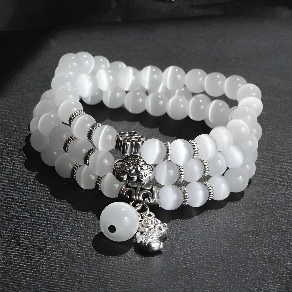 Crystal opal bracelet with 8mm cat eye bead and lucky cat charm in three-ring wrap design
