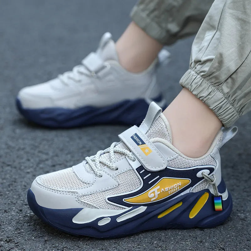 Boys' dark blue and beige PU mesh sports running shoes with Velcro strap and platform sole.