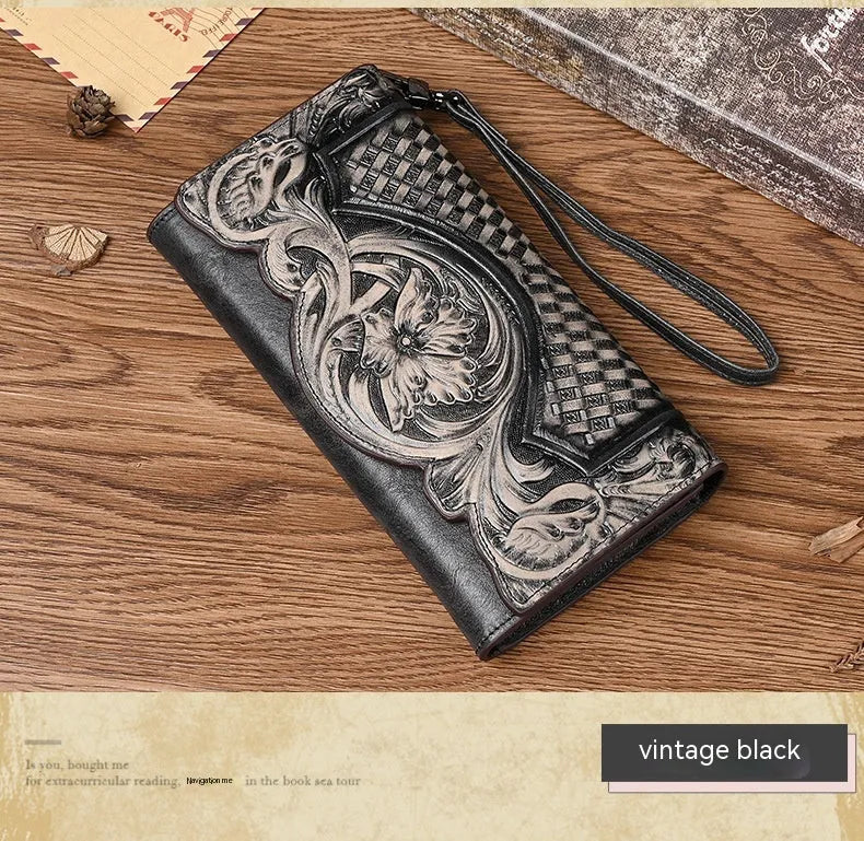 Brown genuine leather tri-fold wallet with embossed floral pattern showing interior compartments
