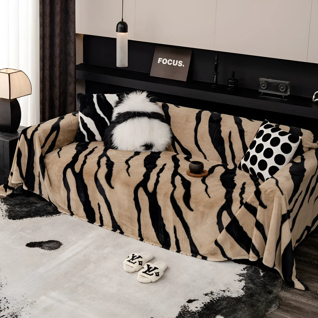 Zebra pattern flannel sofa cover in light luxury style draped over a sofa
