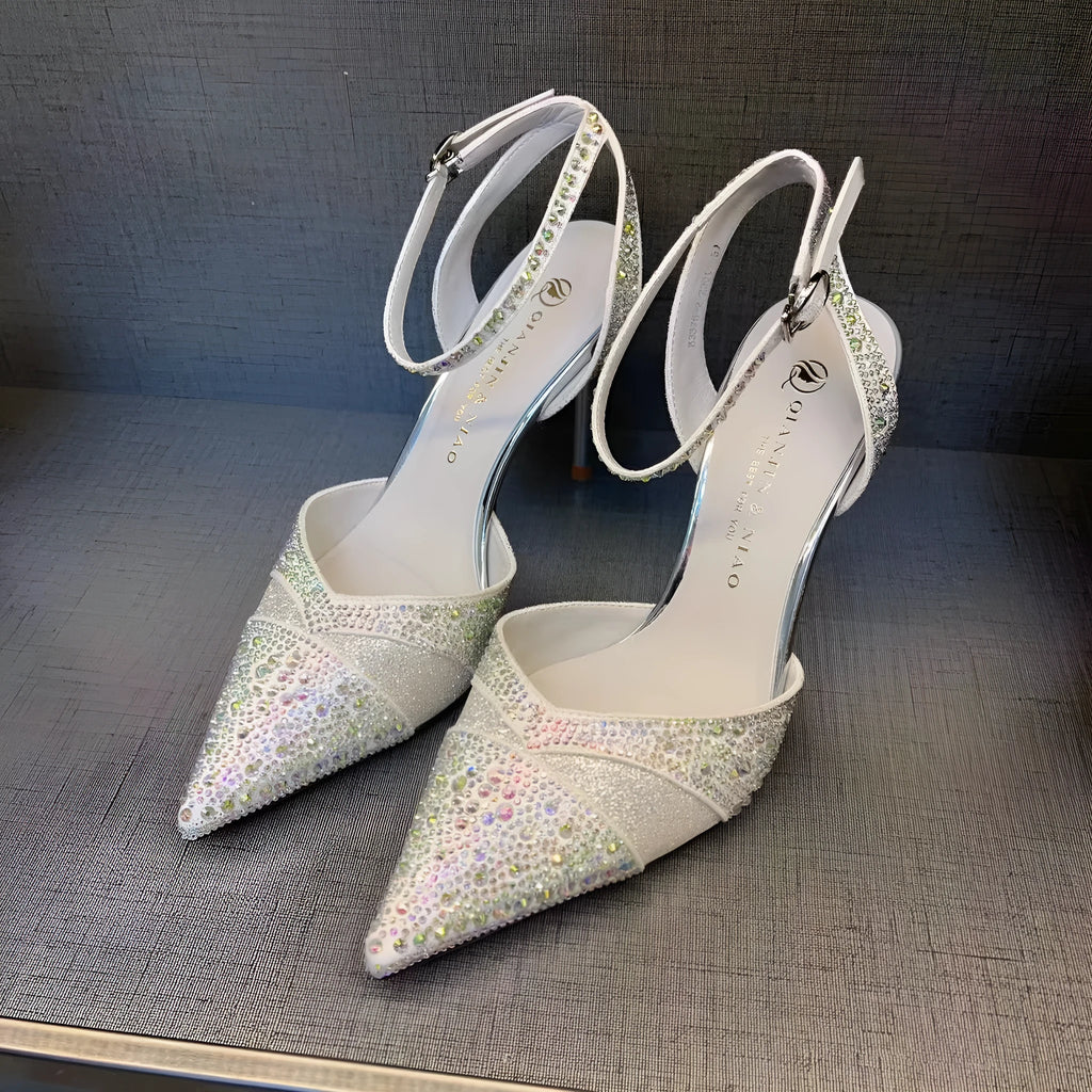 Women's hollow high heels with pointed toe and stiletto heel in black or silver colours