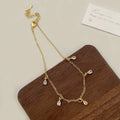 Women's zircon jewellery set with necklace, earrings and anklet in geometric meteor shower design