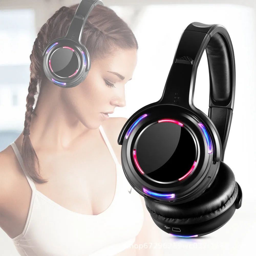 Black silent disco wireless headphones with over-ear design and 3.5mm plug