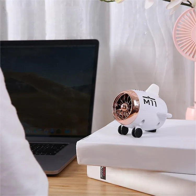 Mini wireless Bluetooth speaker in pink, 85mm x 75mm x 70mm, with plastic body and USB port