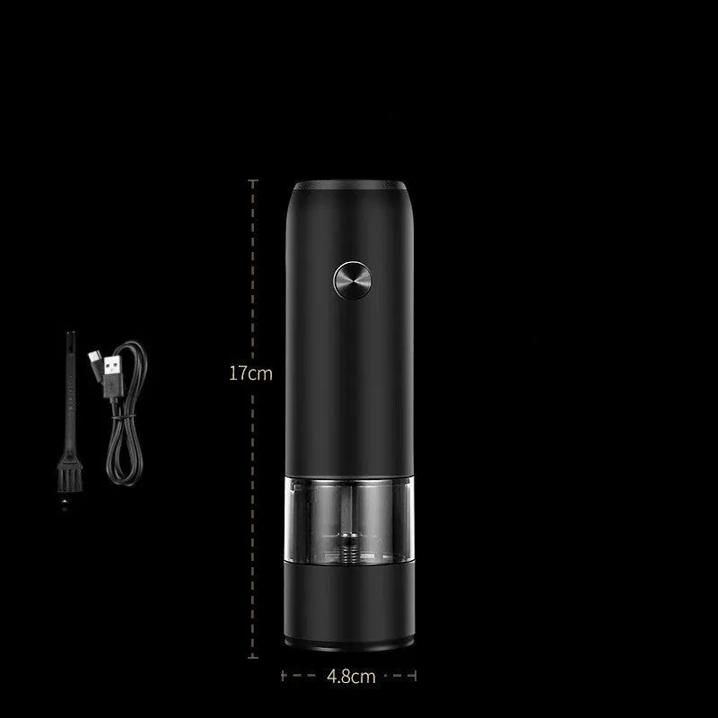 Rechargeable electric pepper and salt grinder set with clear acrylic body, LED light, and USB cable on a countertop