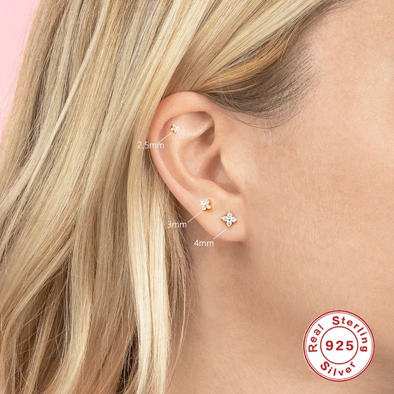 S925 sterling silver stud earrings with a crystal flower petal design in gold or platinum colour.