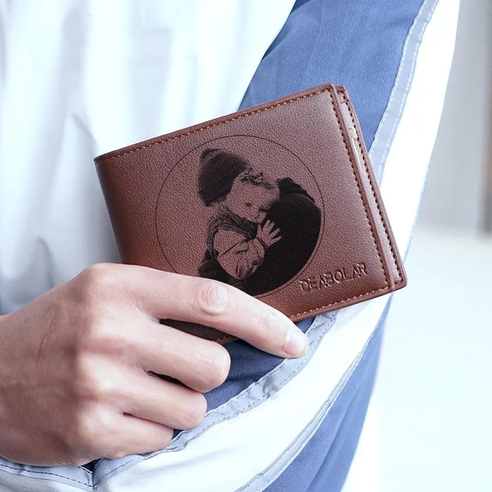 Men's brown leather wallet with a zipper closure, shown front view.