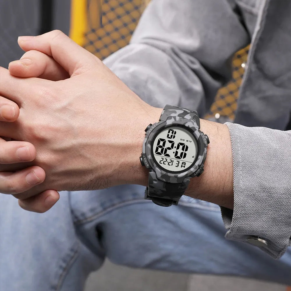 Multi functional waterproof sports electronic watch with 47.42mm dial and plastic band in black camouflage