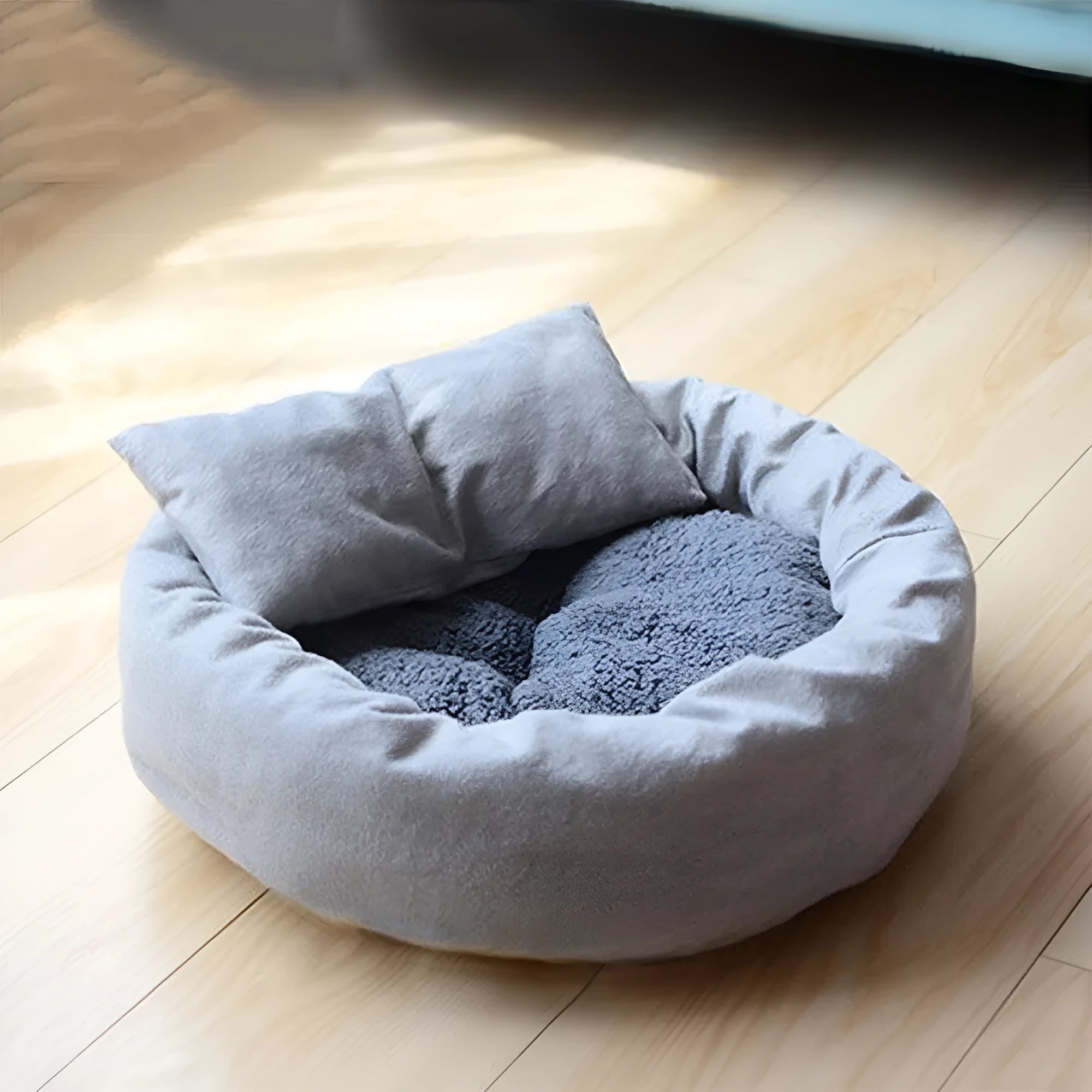 Gray round flannel pet bed for small dogs and cats with pillow on non-slip base