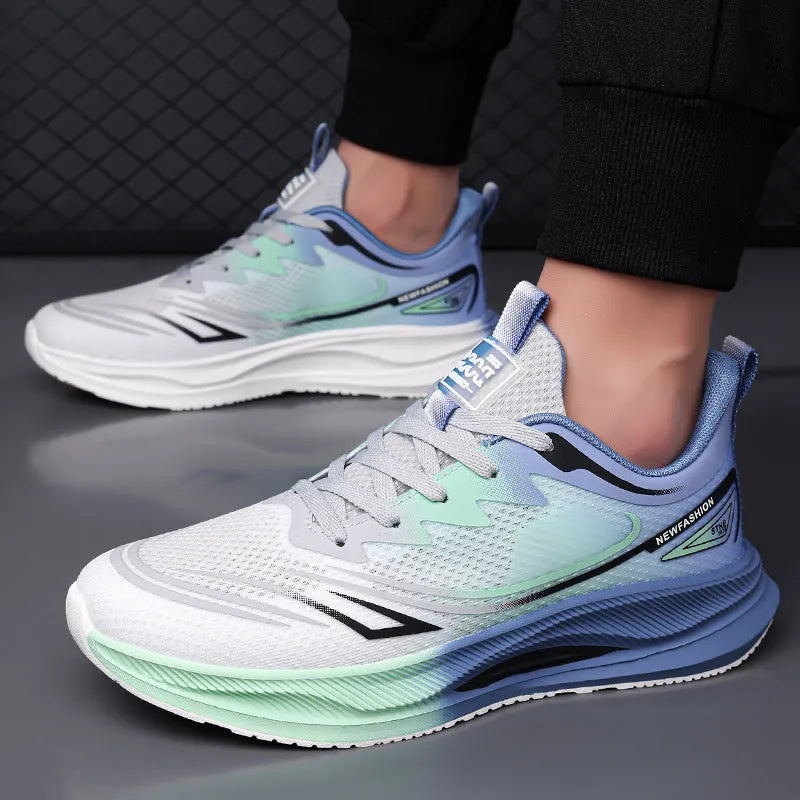 Men's low-top casual trainer in grey-green with woven mesh upper and round toe on a rubber sole.