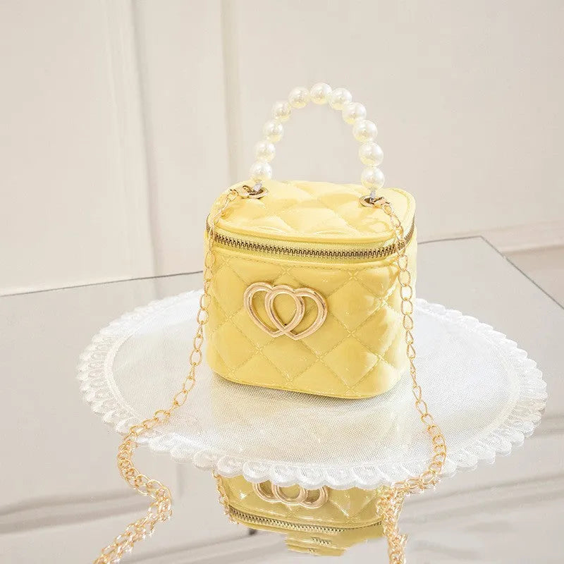 PVC bucket gel bag for women with heart pattern in choice of seven colours.
