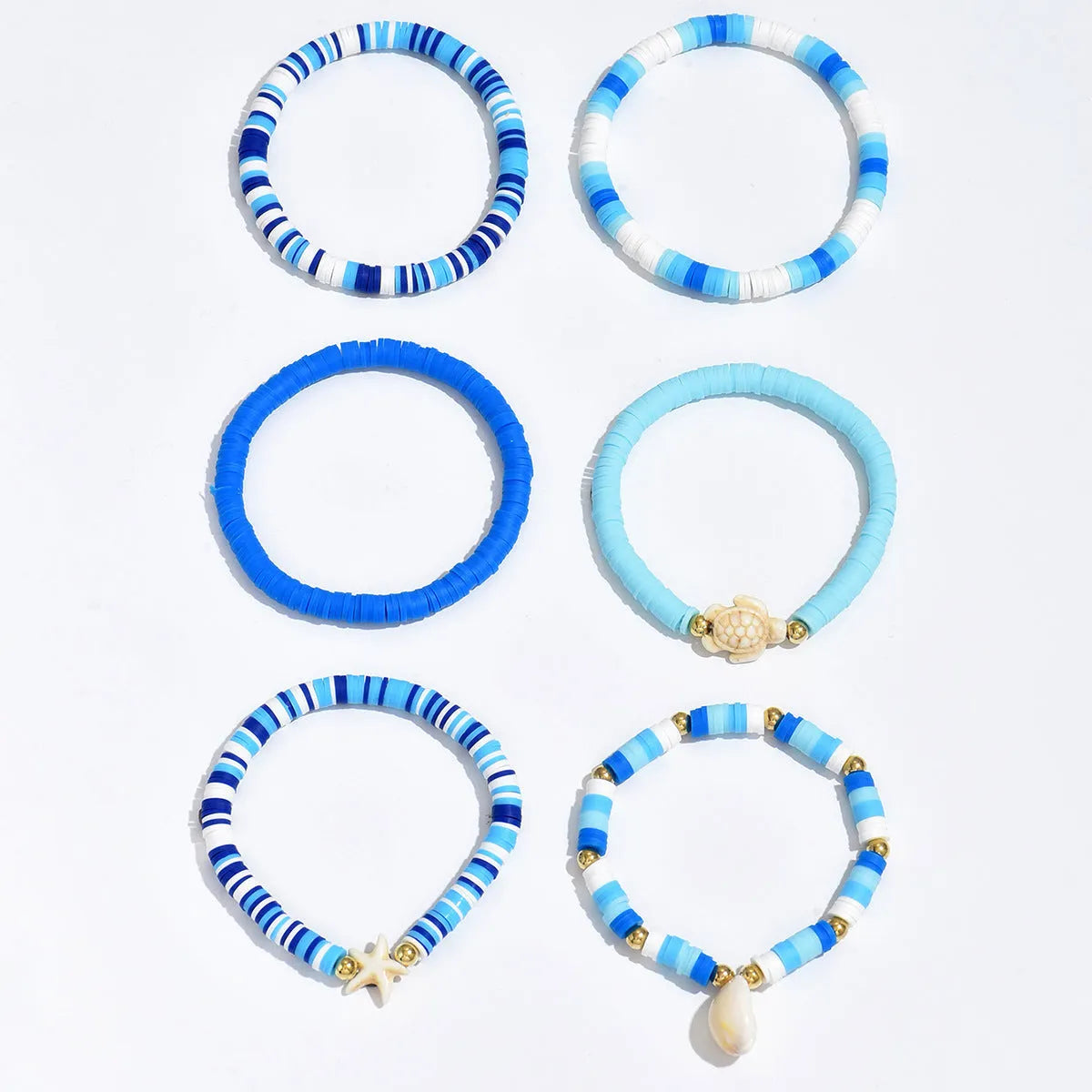 Set of six blue polymer clay handmade shell bracelets with geometric design, unisex bohemian style