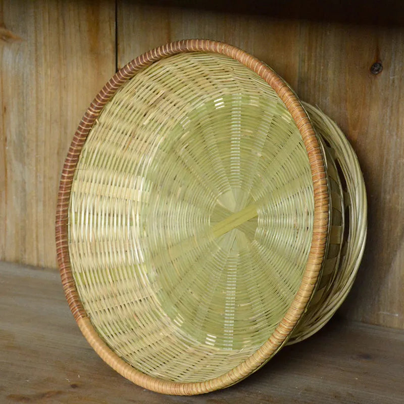 Handmade bamboo storage basket with woven construction in three size options