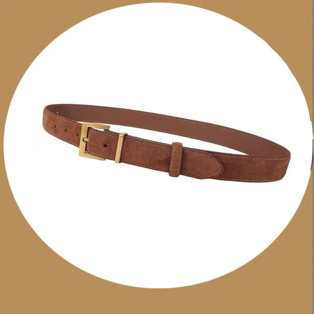 Ladies black genuine leather belt with a silver-toned quadrilateral alloy pin buckle laid flat.