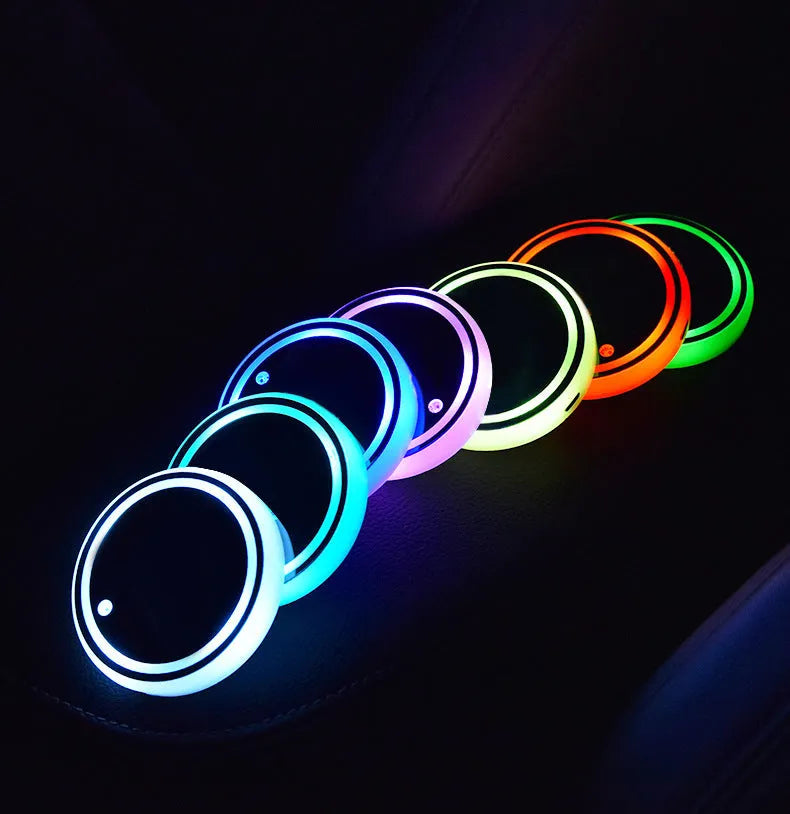 Colourful LED light-up coaster in car cup holder with seven lighting options