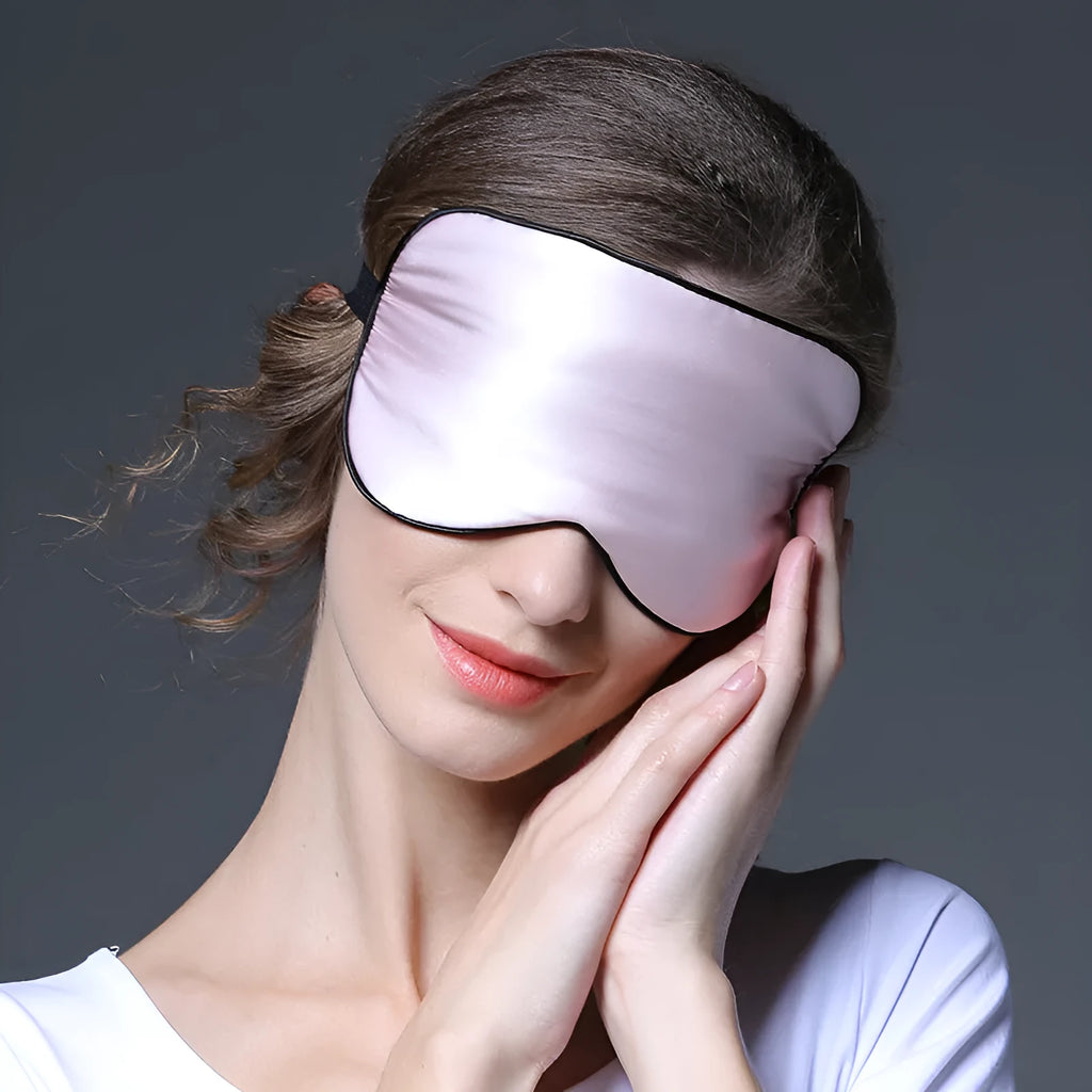 Double-sided mulberry silk eye mask with embroidered print in various colours measuring 22x11cm
