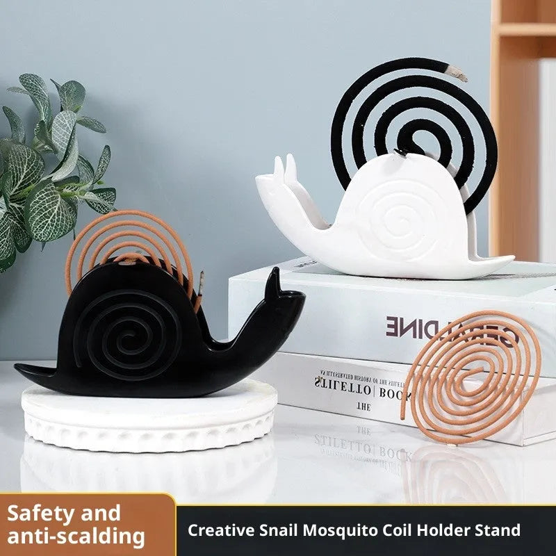 Plastic mosquito incense holder in black creative animal style on a table