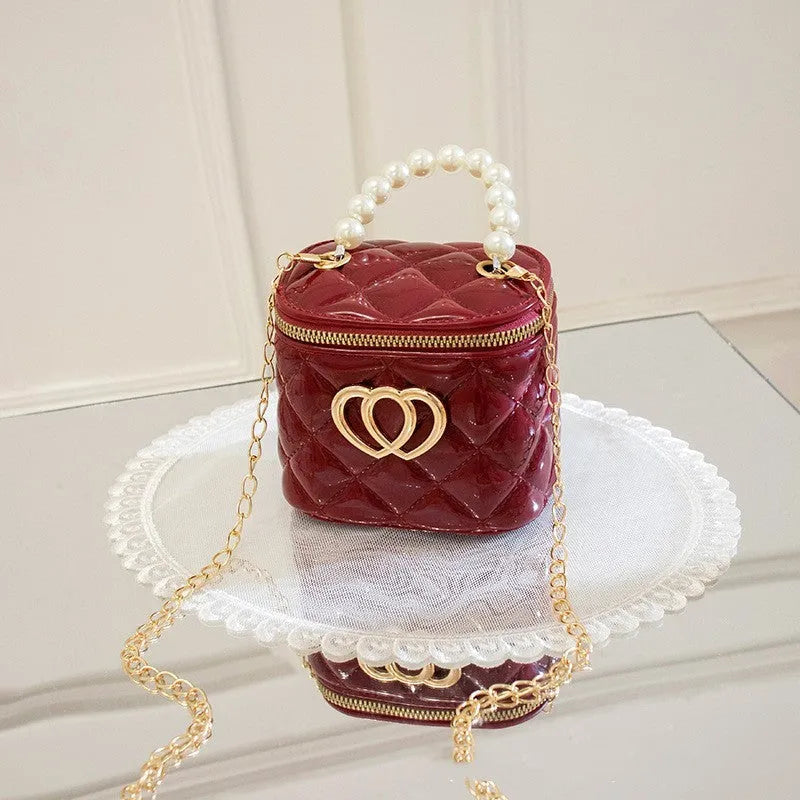 PVC bucket gel bag for women with heart pattern in choice of seven colours.