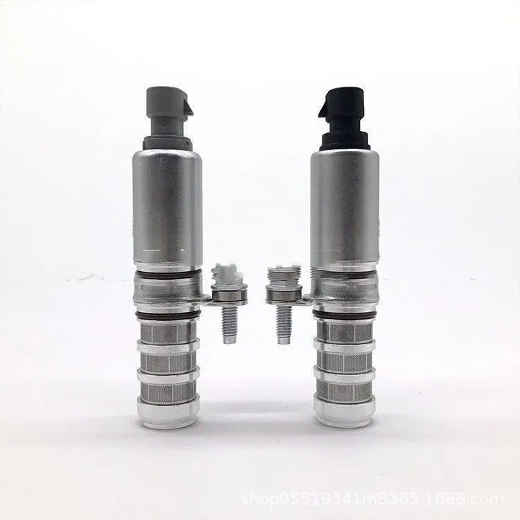 A pair of oil control solenoid valves for Buick and Chevrolet VVT systems.
