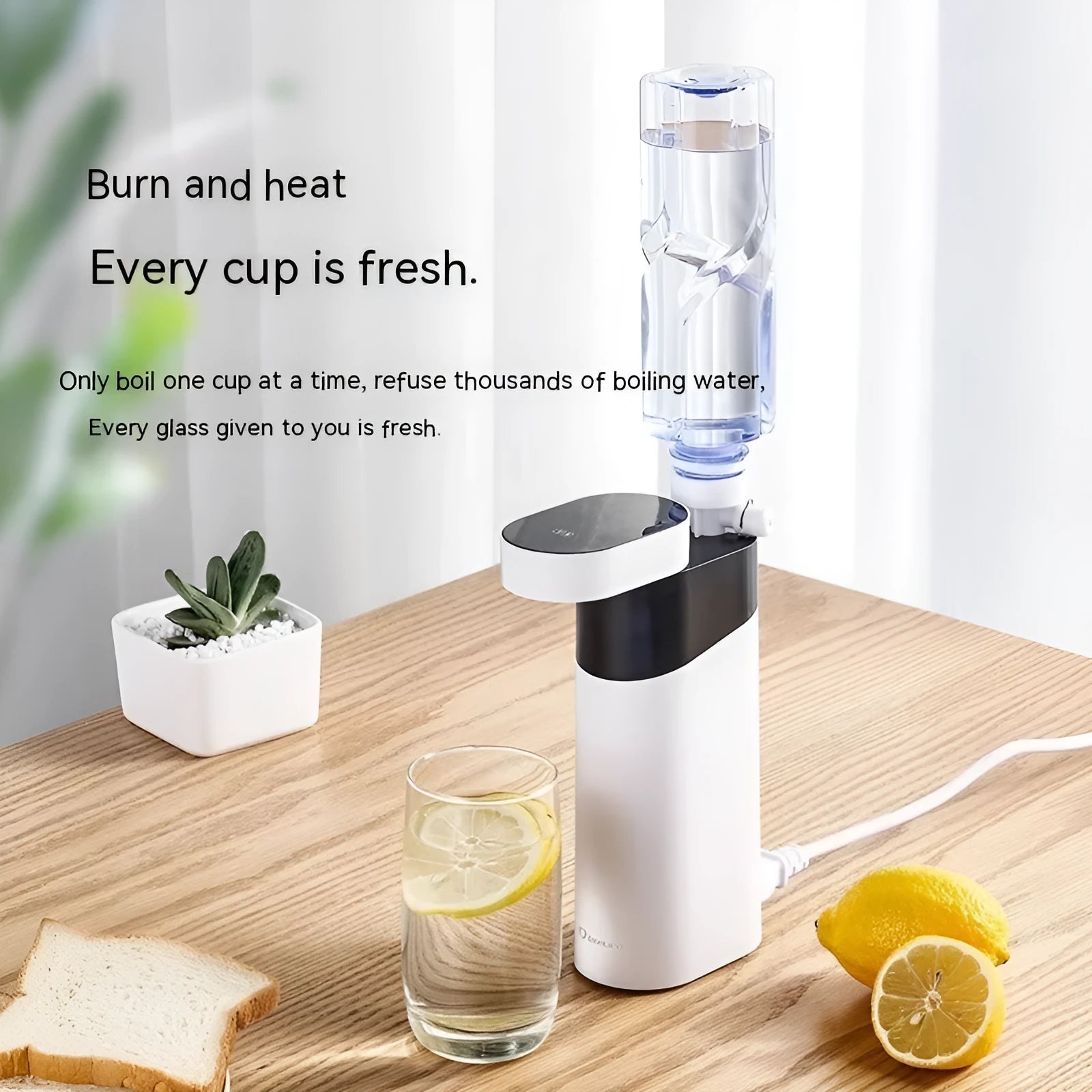 Black or green desktop instant water dispenser with digital display and compact under 1 litre tank.