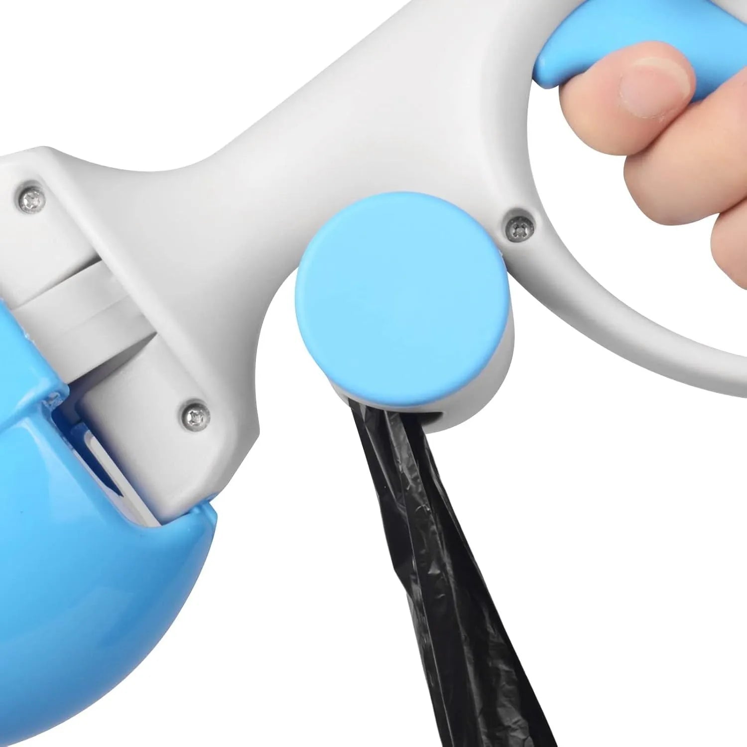 Black pet pooper scooper with built-in bag holder and top carry hook on a grassy background.