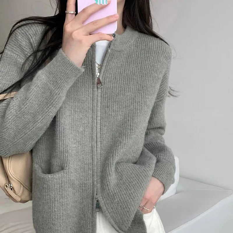 A beige soft glutinous sweater coat cardigan with long sleeves, shown buttoned.